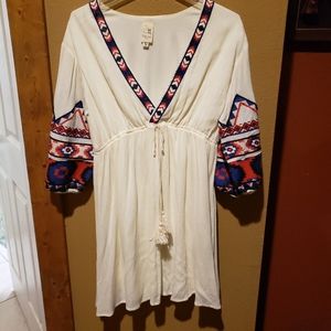 Embroidered cream dress